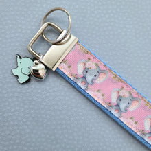 Load image into Gallery viewer, Elephants with Flowers in Watercolor on Silver Key Chain Fob with Enameled Elephant Charm
