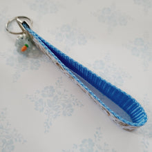 Load image into Gallery viewer, Bunnies with Carrots on White Key Fob Wristlet on Silver or Rainbow
