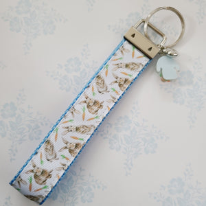 Bunnies with Carrots on White Key Fob Wristlet on Silver or Rainbow