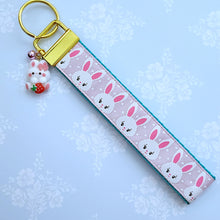 Load image into Gallery viewer, Bunnies with Glittery Faces on Pink Key Chain Fob with Yellow Gold Clasp and Cute Enameled Bunny Charm
