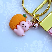 Load image into Gallery viewer, Some Bunny Loves You with Glitter Flowers &amp; Carrots on Gold Key Chain Fob includes Enameled Bunny Charm
