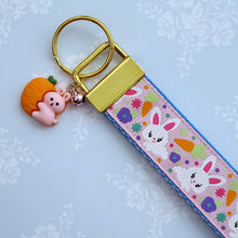 Load image into Gallery viewer, Bunny Flowers &amp; Carrots Glittery Key Chain Fob on Gold with Bunny Charm
