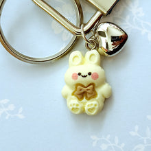 Load image into Gallery viewer, Bunnies In Love on Blue Keychain Fob with Cute Bunny Charm
