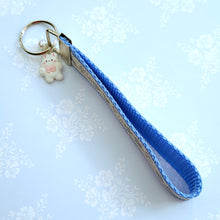 Load image into Gallery viewer, Bunnies In Love on Blue Keychain Fob with Cute Bunny Charm
