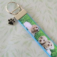 Load image into Gallery viewer, White Puppies Key Chain Fob with Enameled Paw Print Charm
