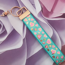 Load image into Gallery viewer, Hearts in Pink on Gold Foil Outline Key Chain Fob on Rose Gold with Rose Charm
